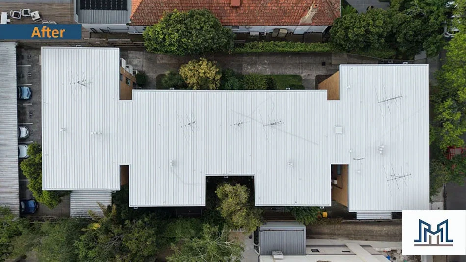 Completed Armadale body corporate roof restoration showing clean white Noxyde finish and even coverage.