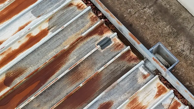 Body corporate metal roof in Armadale showing widespread rust before Noxyde roof restoration works.