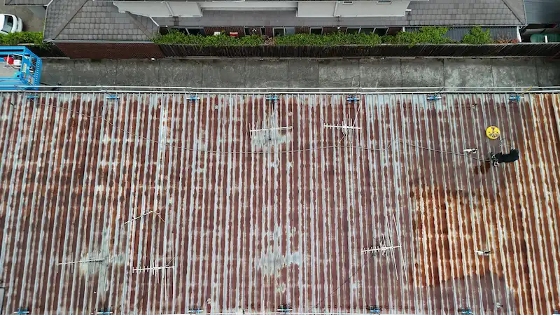 Commercial roof fully cleaned before first coat of Noxyde Anti-Corrosion Waterproofing Membrane.