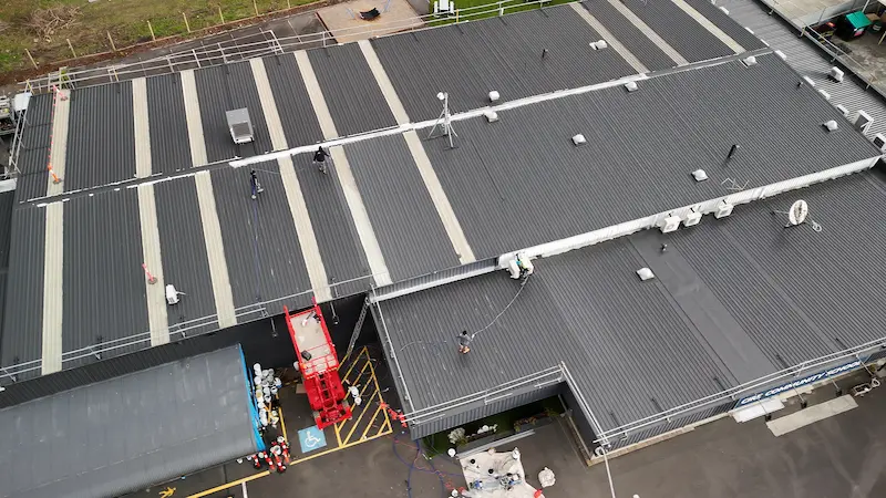 Roof restoration completed with final topcoat for leak and water damage prevention