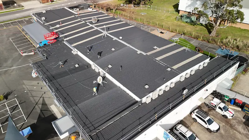 Protective topcoat applied to ensure long-lasting roof durability