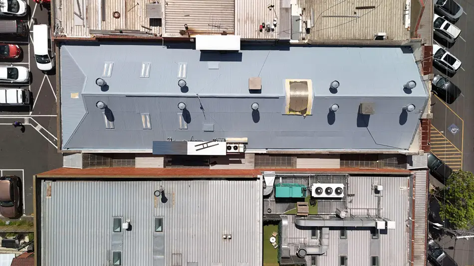 Top-down aerial photo of Fairfield commercial roof after Noxyde restoration