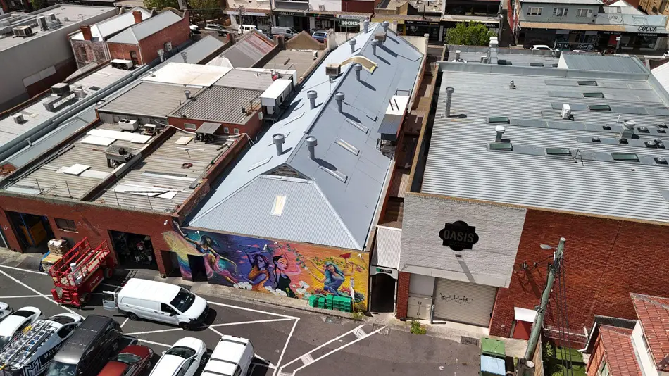 Final aerial angle of restored Fairfield commercial roof with Noxyde system
