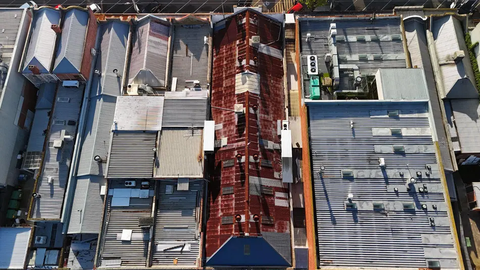 Aerial top-down view of Fairfield commercial roof showing extensive rust