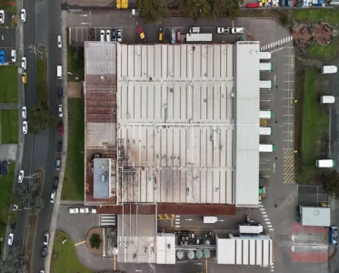 Aerial view of Alsco Mulgrave commercial roof before waterproofing and rust protection works