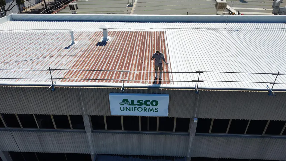 Noxyde waterproofing membrane being applied to the commercial roof at Alsco Mulgrave