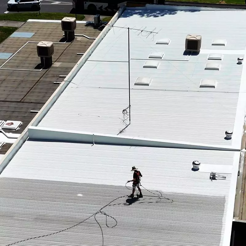 Applying a protective coating to an existing metal roof